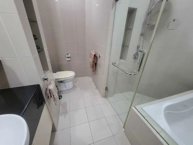 Bathroom with shower enclosure and bathtub