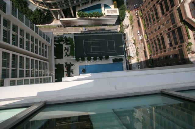 Tennis court and pool seen from the balcony